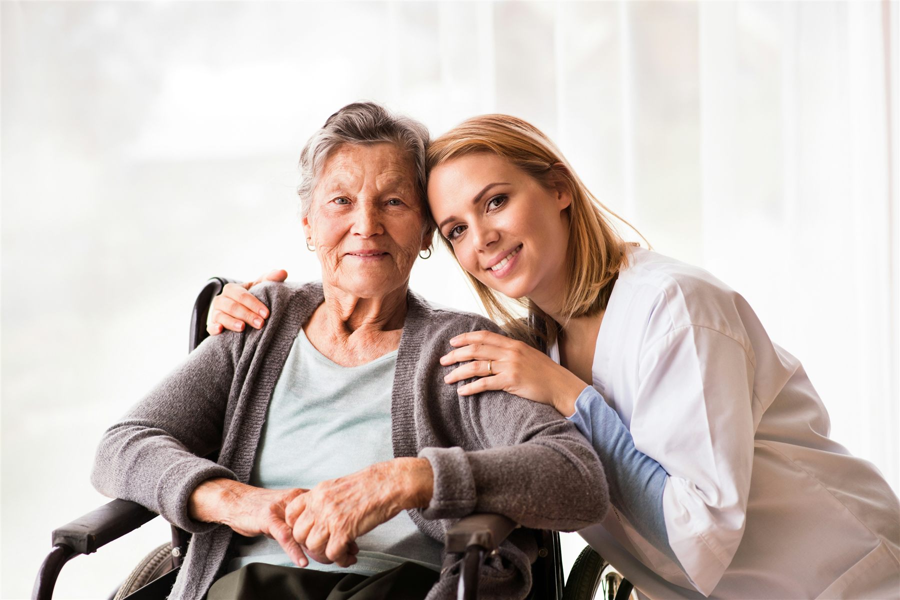 A support worker providing warm, attentive care